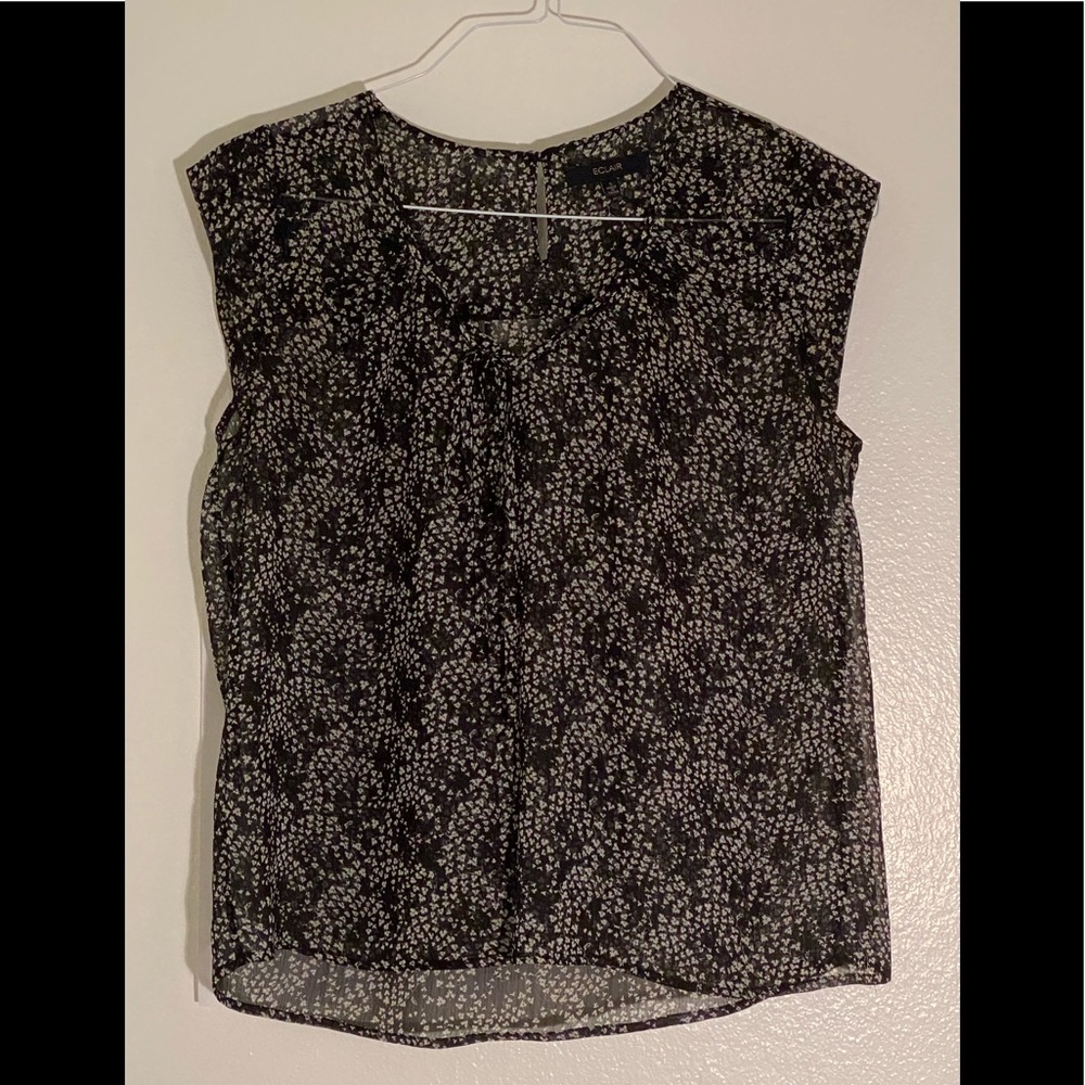 Black and white floral blouse with small bow